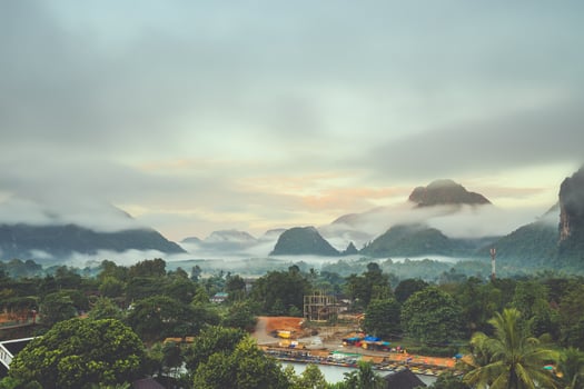 Beautiful sunrise and white mist with mountain at Vang vieng, Laos. photo