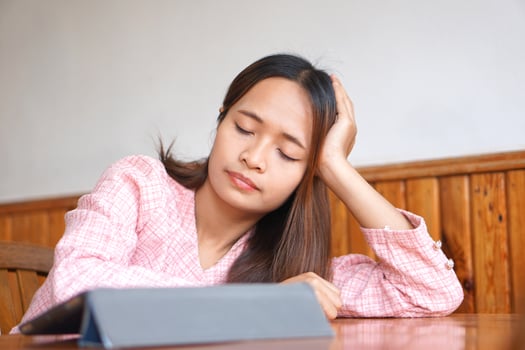 business woman sleepy from overwork photo