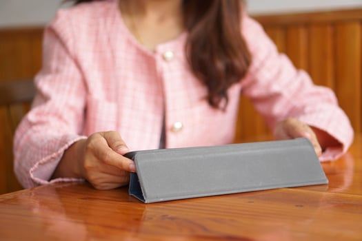 businesswoman hand using computer to analyze sales in order to maximize profits photo