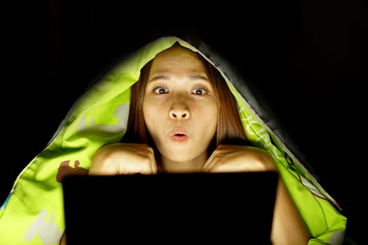 Asian women get turned on by the online movies they watch. photo