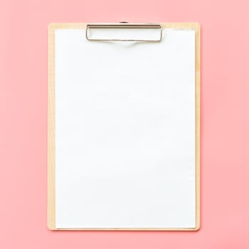 Blank clipboard mock up on pink pastel color background photo