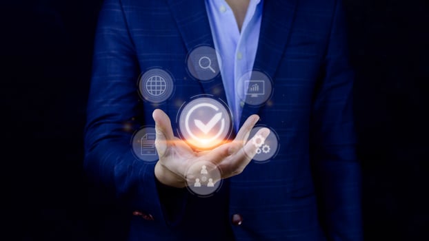 Quality management with Quality assurance or QA and Quality control or QC and improvement. Standardization and certification concept. compliance to regulations and standards. concept with manager. photo