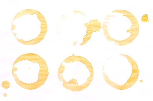 coffee and tea stains on paper background photo