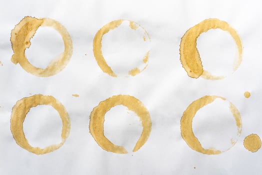 coffee and tea stains on paper background photo