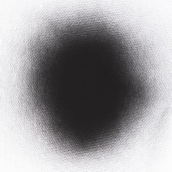 black ink shape on watercolor paper texture background photo