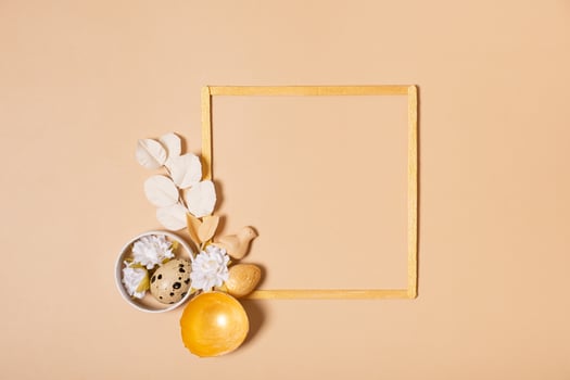 Frame with copy space and Easter eggs composition decorated with twigs and flowers. Easter flat lay monochrome photo