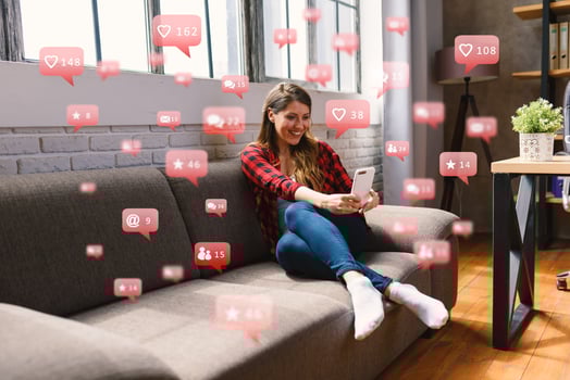 Happy woman chats via smartphone with social network messages, chat and users icons photo