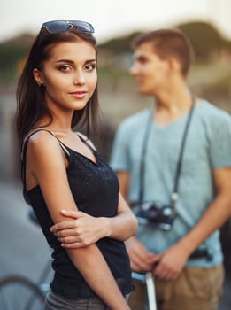 Happy couple with bike in the city photo