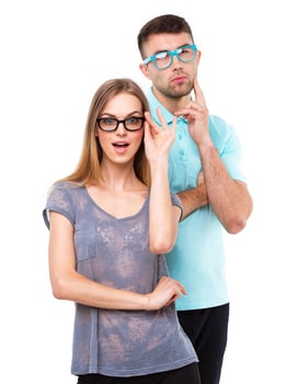 Beautiful young happy couple smiling, man and woman looking at camera, isolated over white photo