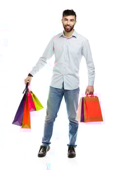 Man holding shopping bags. Christmas and holidays concept photo