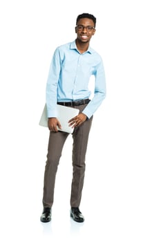 Happy african american college student with laptop standing on white photo