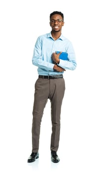 Happy african american college student with books in his hands standing on white photo