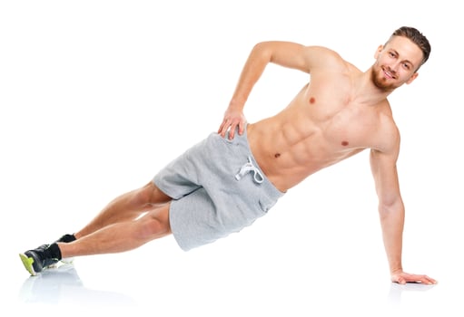 Sport attractive man doing fitness exercises on the white photo