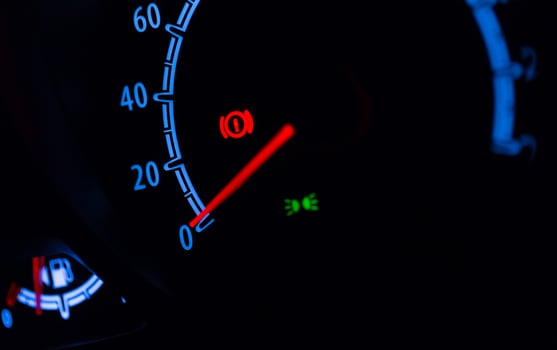 Speedometer illuminated at night photo