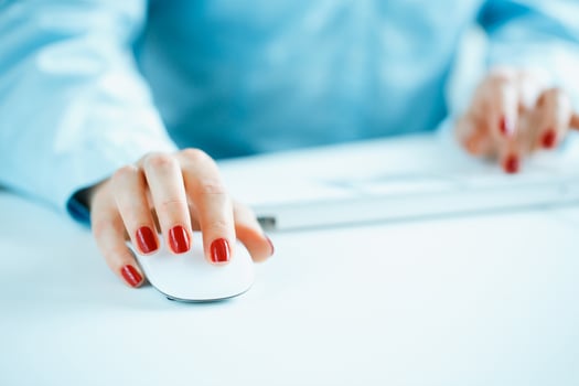 Woman office worker typing on the keyboard photo