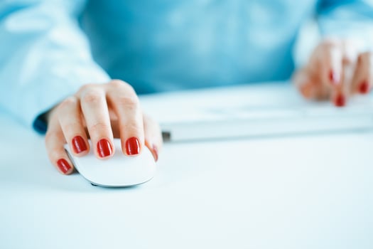 Woman office worker typing on the keyboard photo
