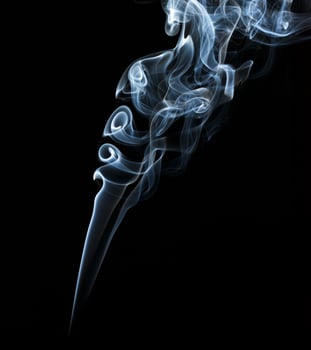 Abstract light smoke on dark background photo