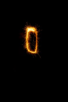 made with sAlphabet element made with sparklers ready for your inscriptions on black background photo
