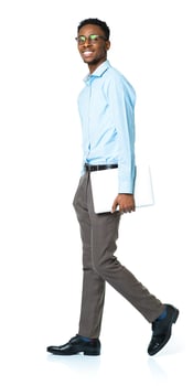 Happy african american college student standing with laptop on white photo
