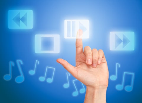Hand pressing button play music photo