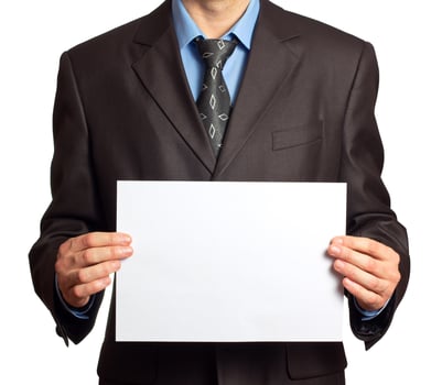 Young businessman with blank board photo