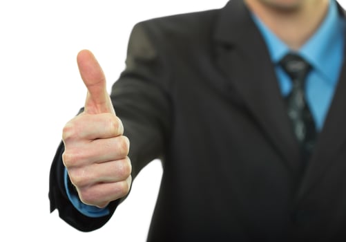 Business man hand with thumb up photo