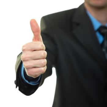 Business man hand with thumb up photo