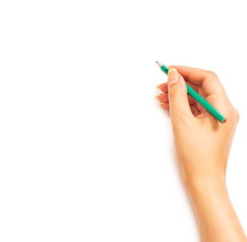Woman's hand holding a pencil photo