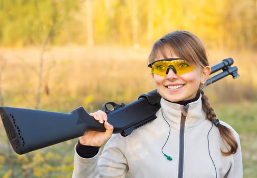 Girl with a shotgun photo
