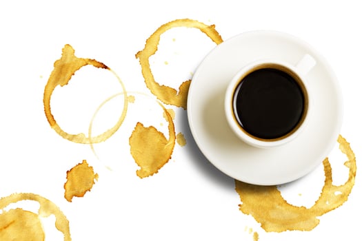 Cup of coffee and the prints photo