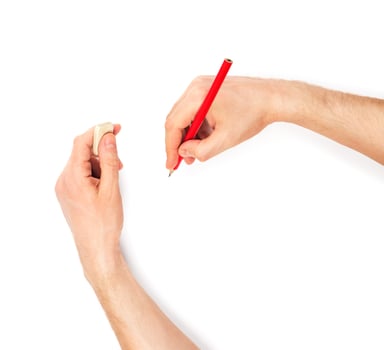 Human hands with pencil and erase rubber photo