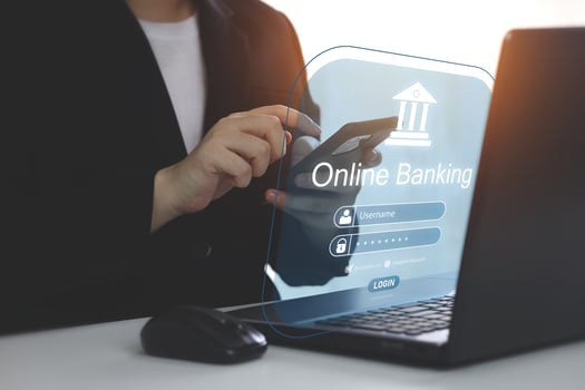 Online banking, and financial management networks online. Human hand using online banking application on mobile. Concept of online payment with encrypted security to access transaction data photo