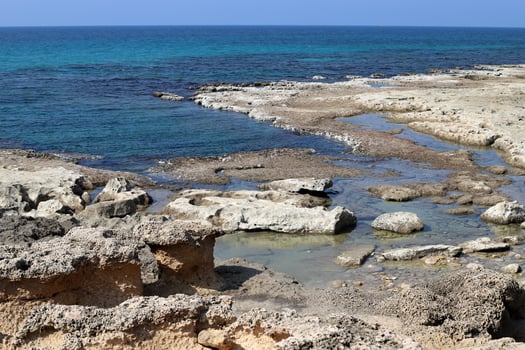 Rocky shore of the Mediterranean Sea in northern Israel. photo