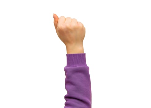Woman hand with clenched fist on isolated white background. photo