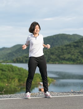Woman short hair doing exercising outdoor photo