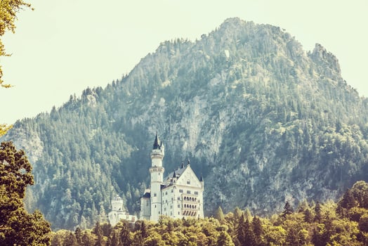 Beautiful view of world-famous Neuschwanstein Castle, the nineteenth-century Romanesque Revival palace built for King Ludwig II on a rugged cliff near Fussen, southwest Bavaria, Germany photo