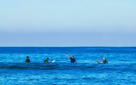 Puerto Escondido Oaxaca Mexico 2023 Surfer surfing on surfboard on high waves in Puerto Escondido Mexico. photo