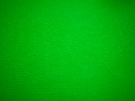 green velvet fabric texture used as background. Empty green fabric background of soft and smooth textile material. There is space for text.. photo