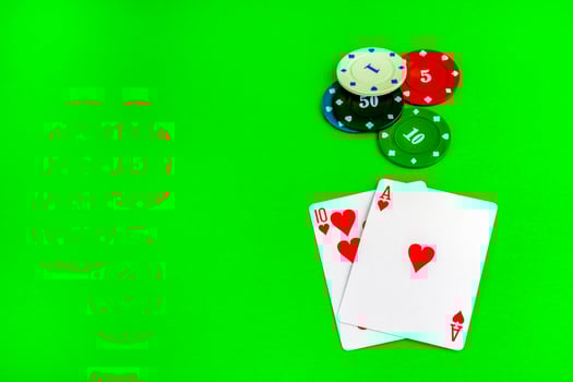 Poker game, ace and ten cards and chips on the poker table. photo