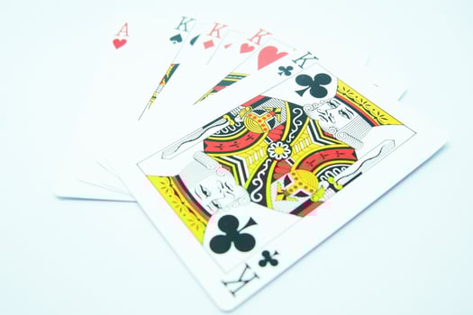 four of kind in poker game , with four of K's and Ace photo