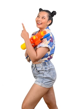 Portrait smiley woman in Songkran festival with water gun photo