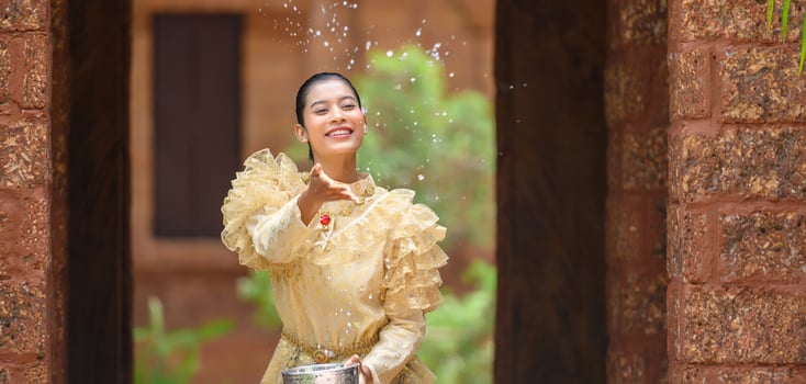 Portrait beautiful woman in Songkran festival with Thai Traditional costume photo