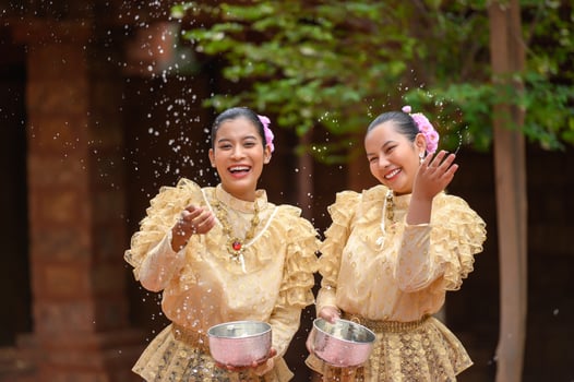 Portrait beautiful women in Songkran festival with Thai Traditional costume photo
