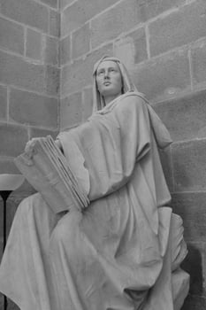 monochrome photography of religious statue photo
