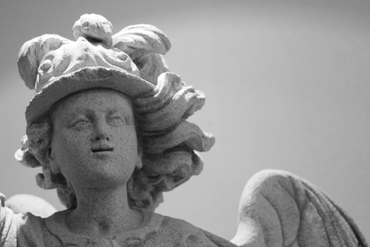 monochrome photography of religious statue photo