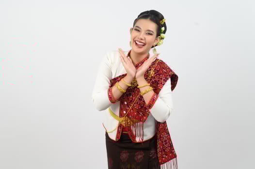 Asian pretty woman in northeastern dress stand in beautiful Thai dance photo