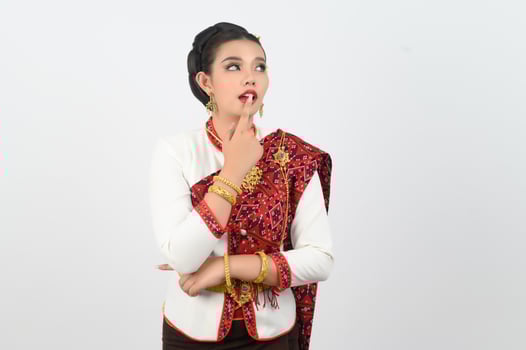 Young beautiful woman Thai Lanna dress on with shouting posture photo