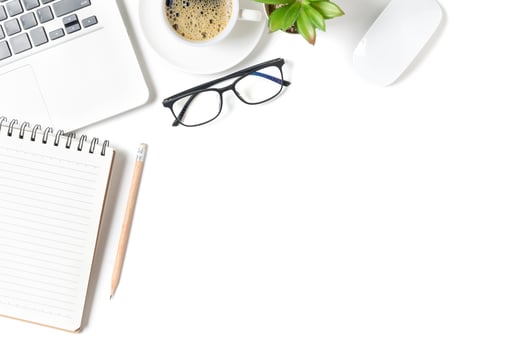 White office desk table, Blank notebook with laptop and hot coffee. photo