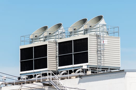 Cooling water tower on rooftop building photo