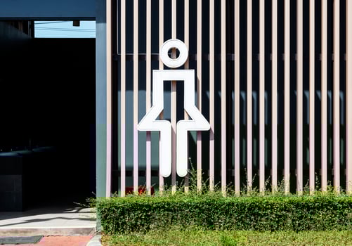 Light box woman icon toilet in gas station photo